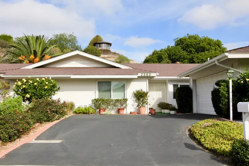 Camino Crest, Oceanside, California. blue and white sky, road
