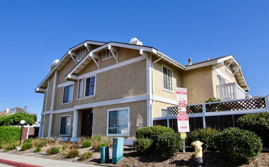Carefree Village, Oceanside, California, blue sky, trimmed bushes