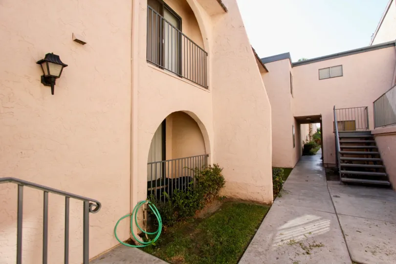 Casa Collado, Oceanside, California, arch, brown staircase