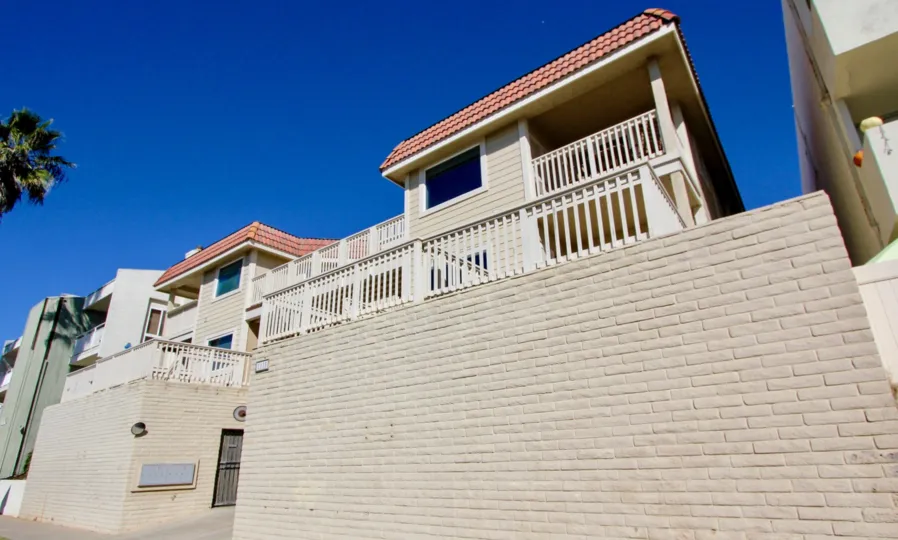 Casa Vallerta, Oceanside, California, bright blue sky, balcony