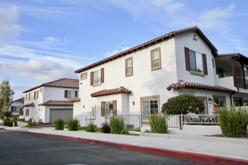 Casitas at Spring Creek, Oceanside, California, blue sky. plants
