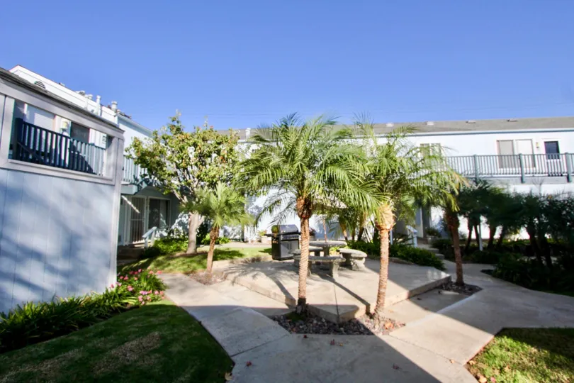 A brown residential building with two garages in Driftwood Estates in Oceanside California