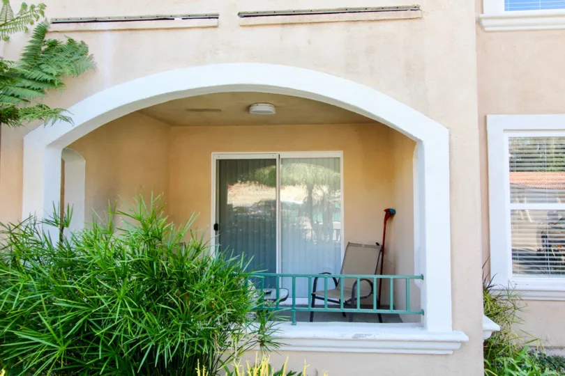 House with a beautiful glass door entrance with ceiling light in La Costa Villas.