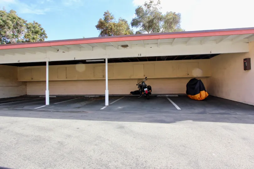 Motorcycles under the covered parking at La Montana in Oceanside, CA