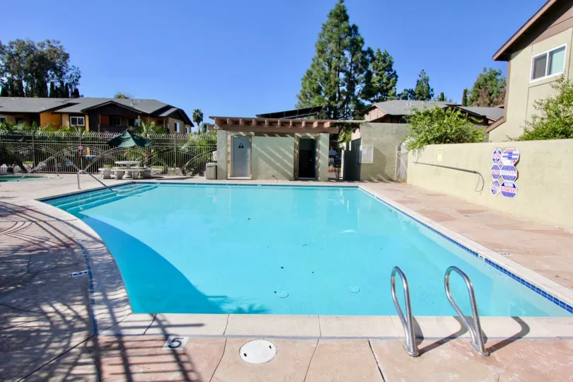 Relax by the pool on beautiful sunny days at Lakeshore Villas.