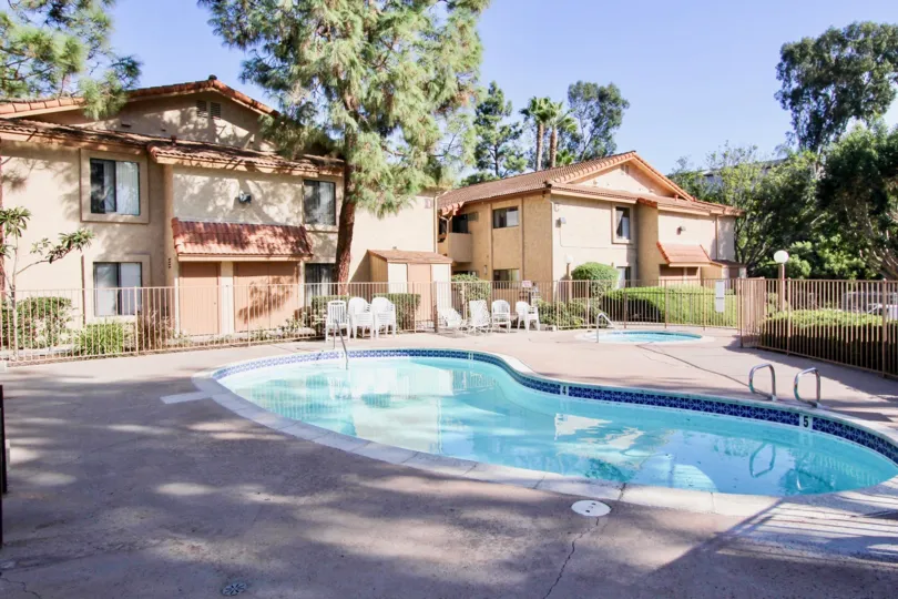 Sit by the pool at this beautiful manor in Oceanside, California