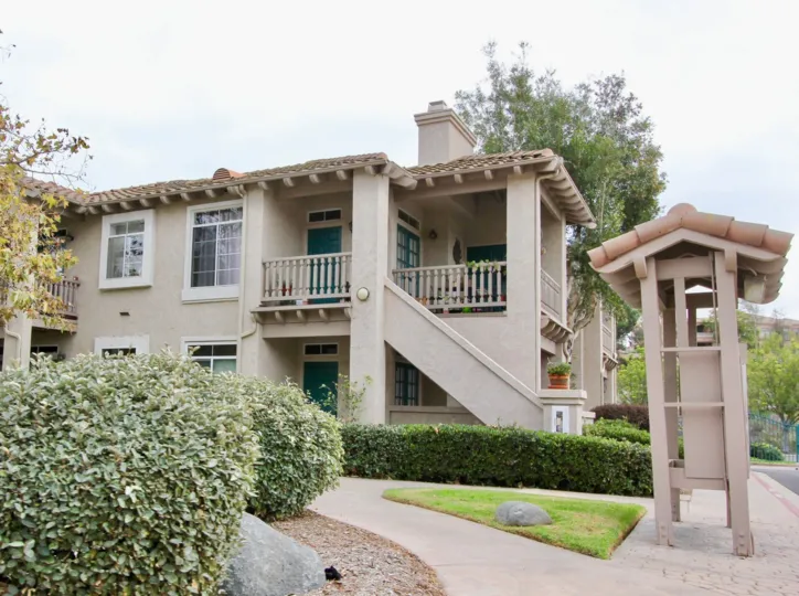 The neatly-trimmed hedges surrounding the Lomas De Oro community in Oceanside, California.