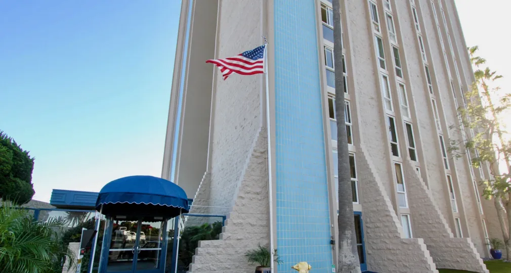 A beautiful building sitting in front of the pale blue sky in Oceanside California