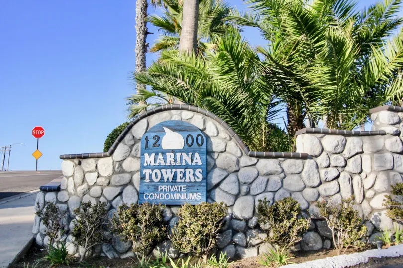A look at the beautiful landscaping marking the main entrance to the Marina Towers Condominiums In Oceanside, CA