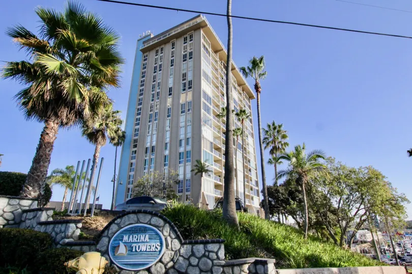 The Marina Towers Complex around north side and west side of freeway along with trees and located city of Oceanside