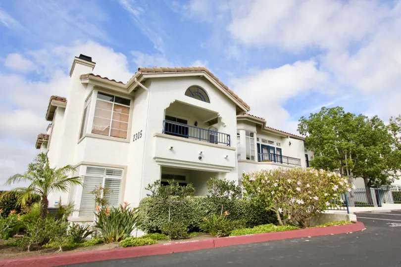 THE 2305 APARTMENT IN THE MISSION DEL ORO WITH THE TREES, LAWN, PLANTS.