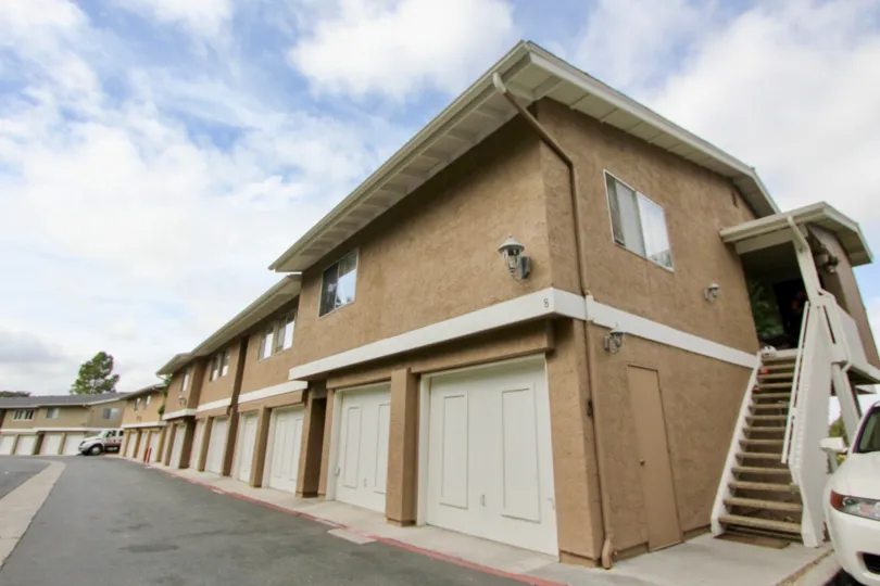 Tan above garage apartments in mission view Oceanside California