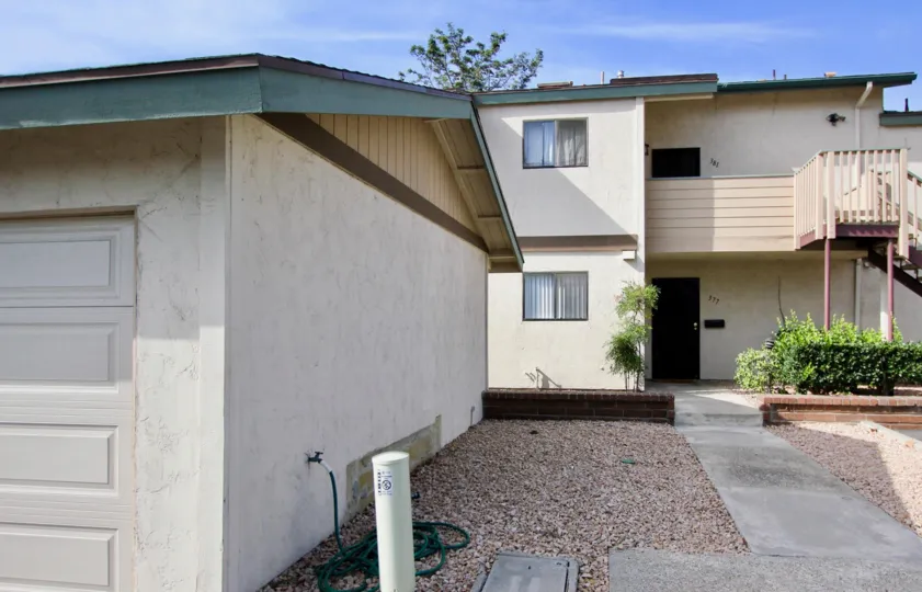 Apartment complex with garage in mission vista with stairs in a warm area