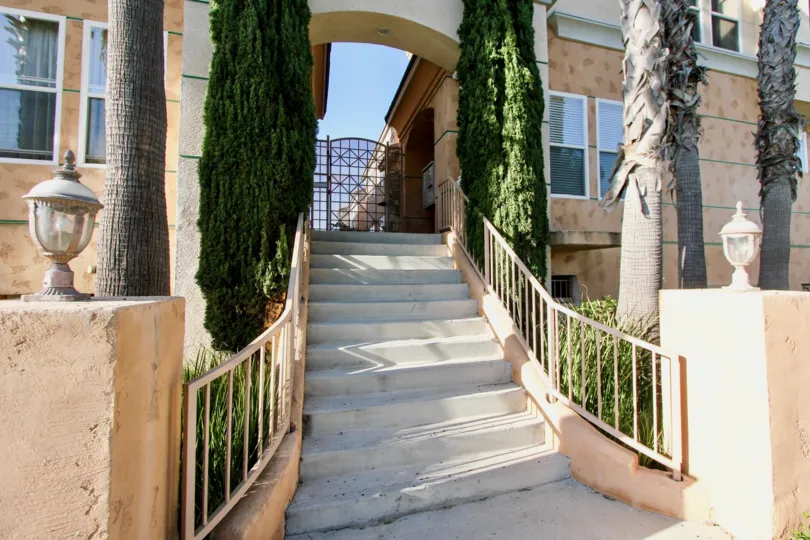 The sun shining on this Oceanside manor house on a beautiful day