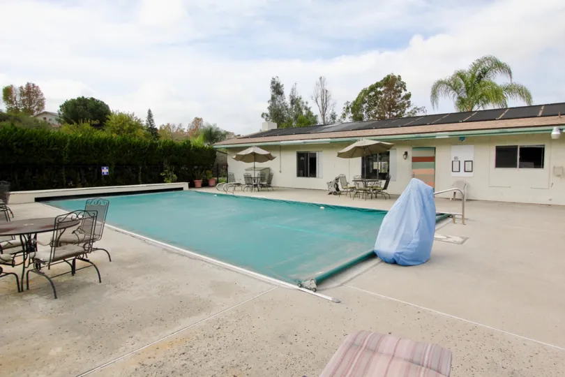 Large pool near a community club house inside Oceana Mission at Oceanside CA