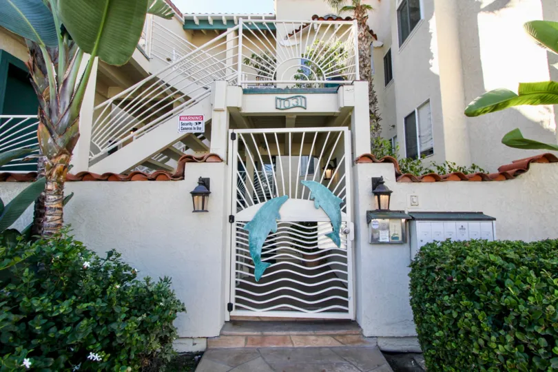 Indian style home with Iron gate and staircase in Oceanfront Paradise.