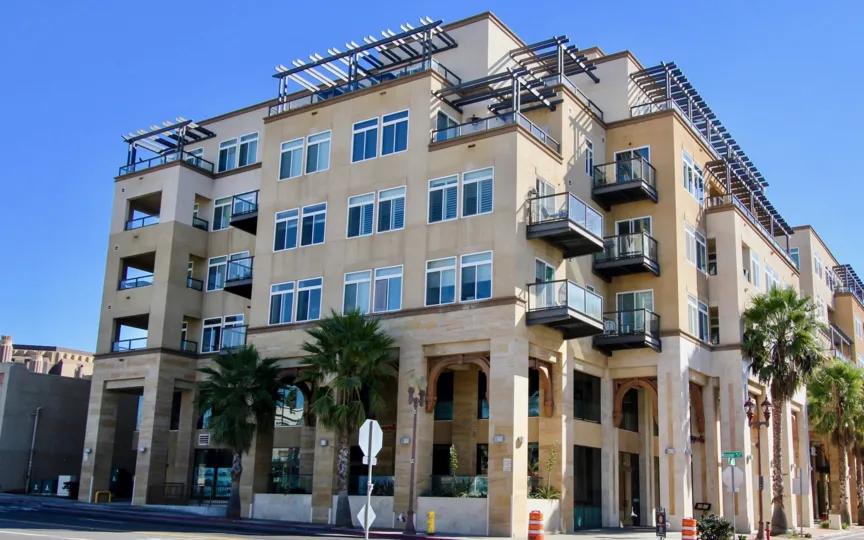 The exterior of the gorgeous Oceanside Terrance building with private balconies and sunny rooftop penthouses.