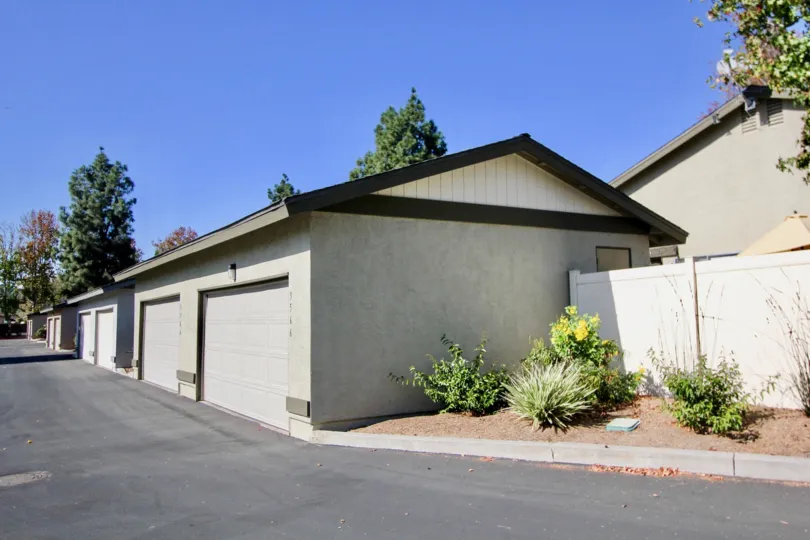 Driveway next to parking garages inside Orchard Lane at Oceanside CA