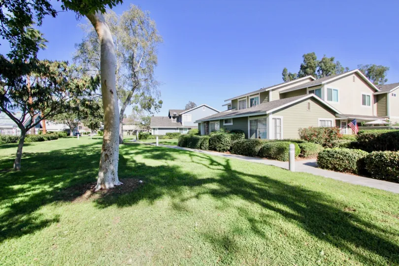 Grass yard with trees inside Park Circle at Oceanside California