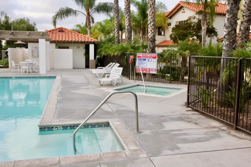 Enjoy the swimming pool and hot tub for fun and relaxation at Rancho Rose.