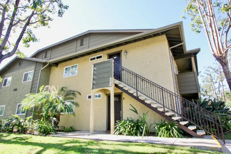 Brown iron stairway leading to a residence at River Trail in Oceanside CA