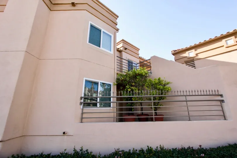 Beautiful beige house with green foliage located at San Miguel lll