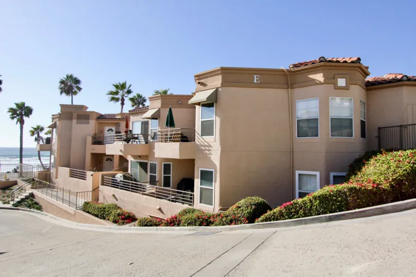 A clear sunny day at the oceanside condo buildings in the community of San Miguel III in Oceanside, CA