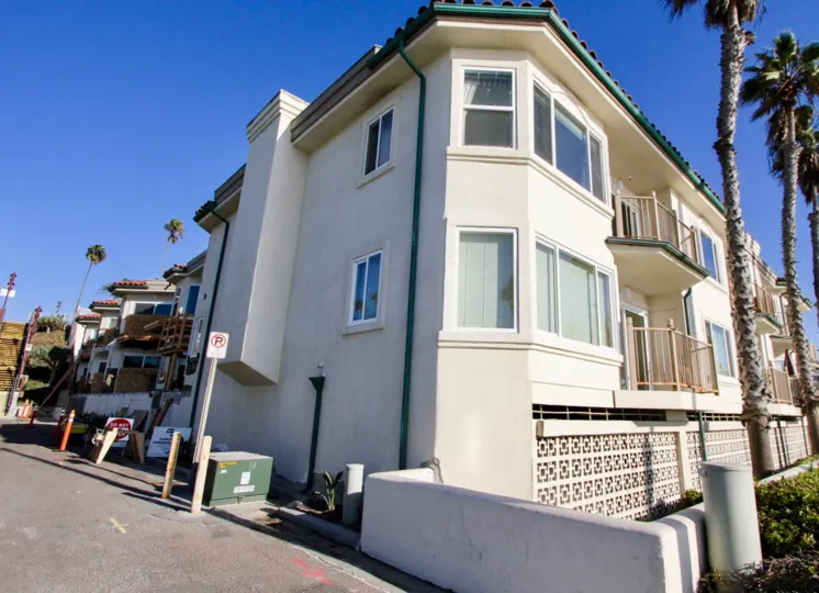 Residences in the San Miguel community with palm trees in Oceanside, California