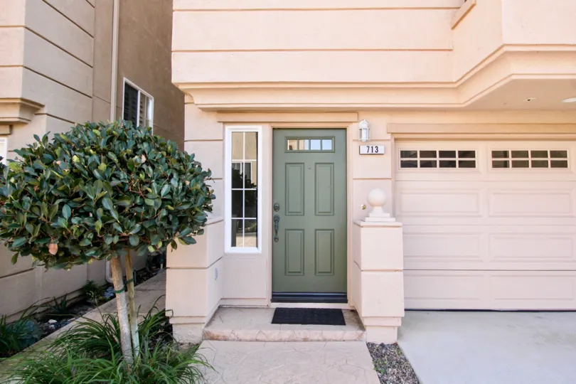 A close up of the front of a apartment in the Sea Breeze Beach Cottages