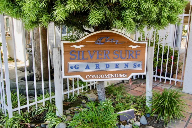 THE VILLAS IN THE SILVER GURF GARDENS WITH THE TREE, SILVER SURG GARDENS CONDOMINIUMS BOARD