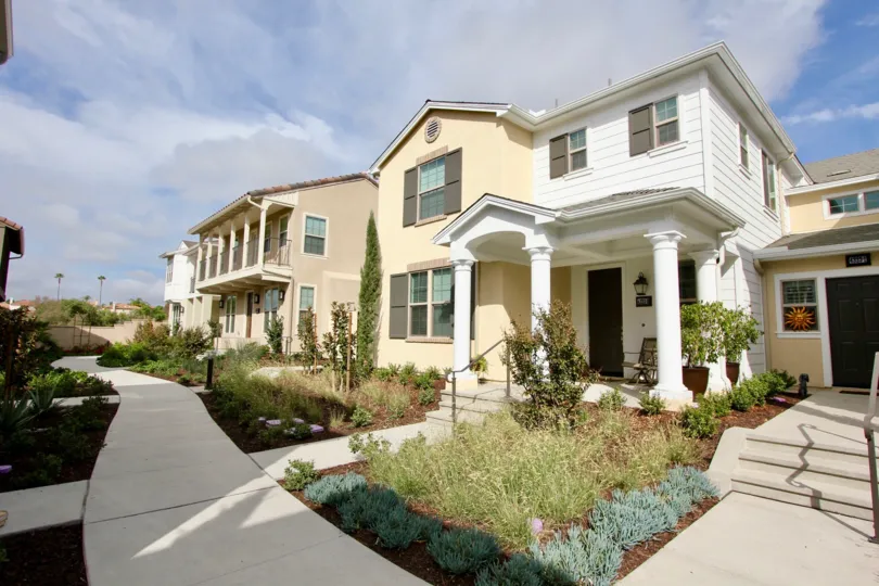 Beautiful front entries with porches for friends at St Cloud at Ocean Ranch.