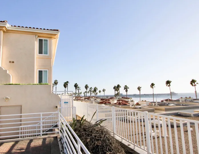 THE HOUSE IN THE VILLA PACIFIC WITH THE OCEAN, TREE, PLANT.
