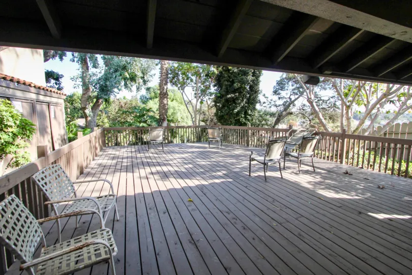 Take a load off and sit and read on this rustic deck in Oceanside California