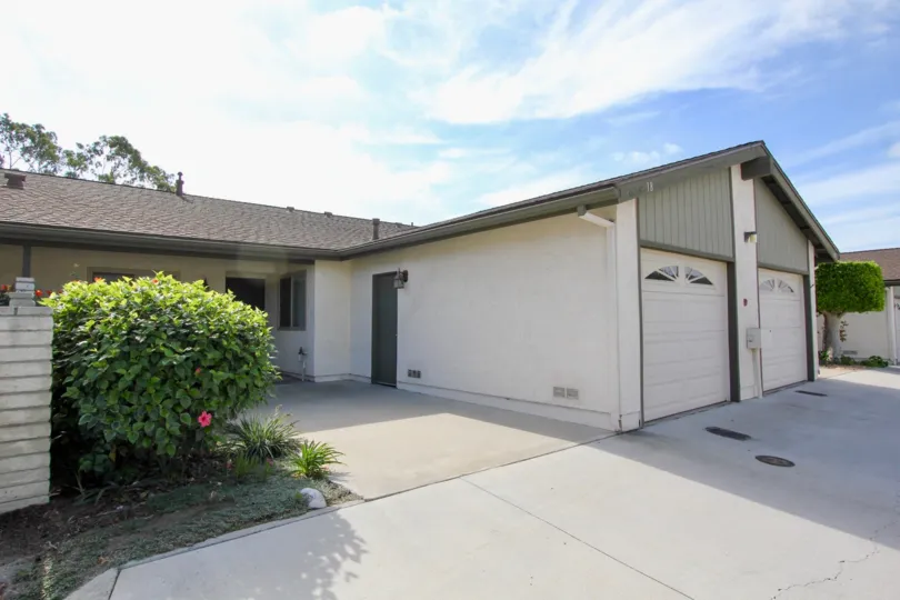 Car parking area separated with home at home and broad way to home in Vista de Oceana.