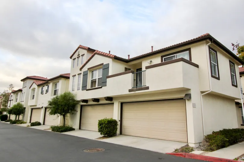 Tucked under garages and private balconies at Vista Monte in Oceanside, California