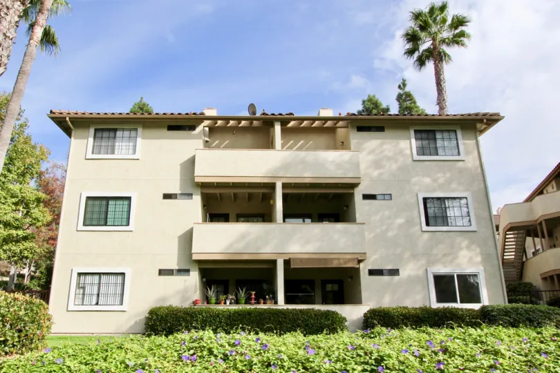 Sunny day of Vista Way Village in Oceanside, CA with flowering plants