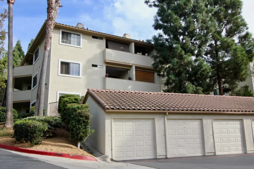 Vista Way Village Oceanside California, great view of three story complex with garages for parking and storage.