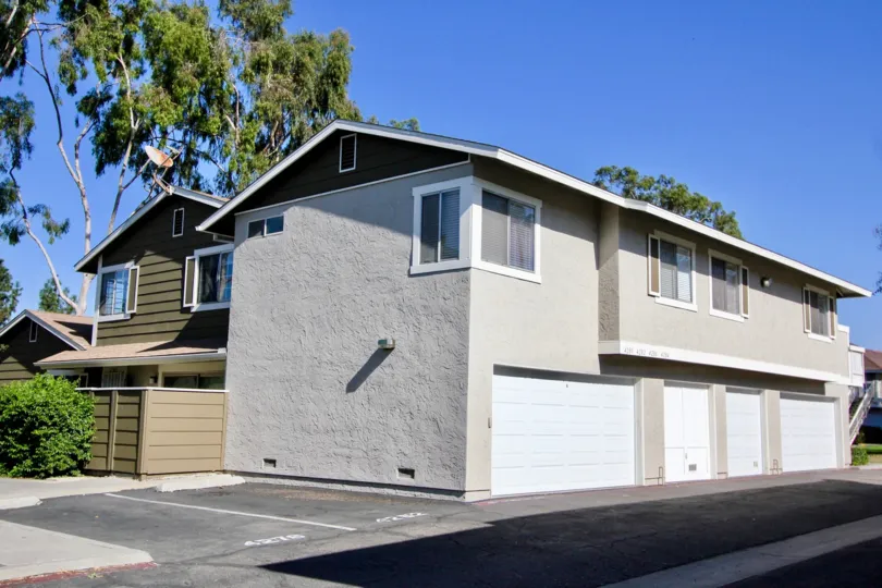 A cement home in Whelan Ranch in Oceanside, California on a sunny day.