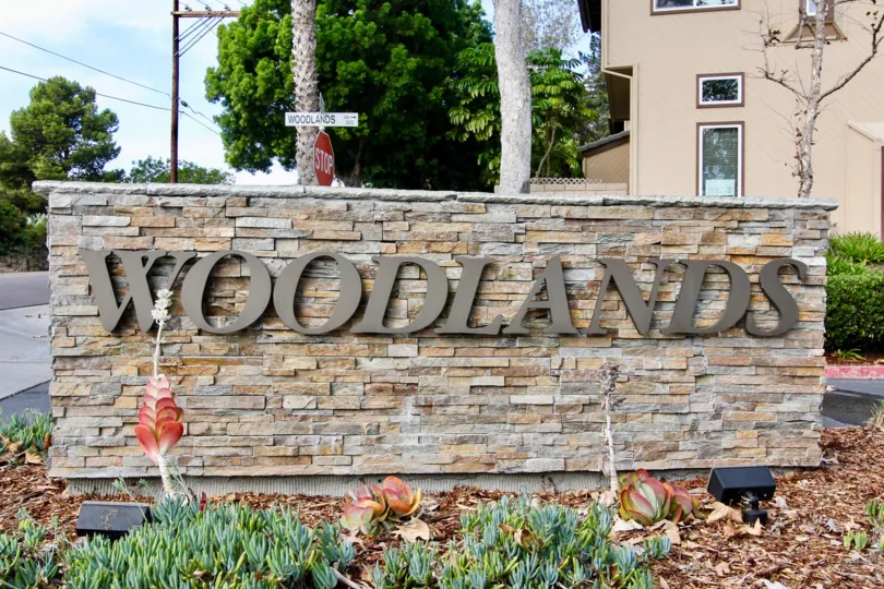 Prominent sign at Woodlands Ivy in Oceanside, California.