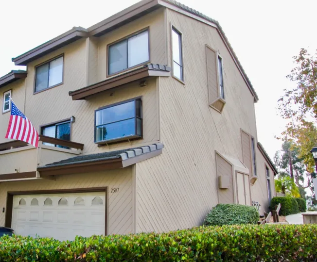 Plenty of windows and greenery at Woodlands Ivy in Oceanside, California.