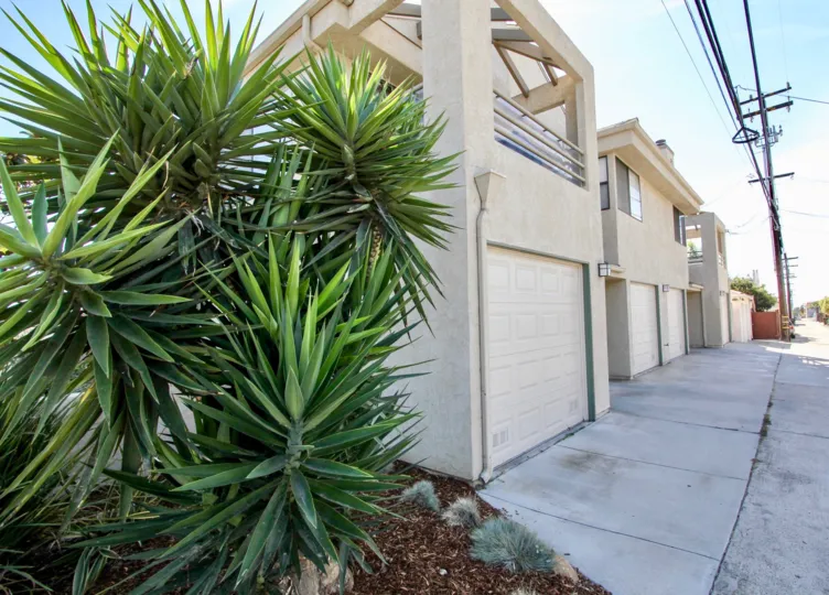 Excellent parking place with Green Trees in front of a villa showing electric lines in 1076 Opal of Pacific Beach