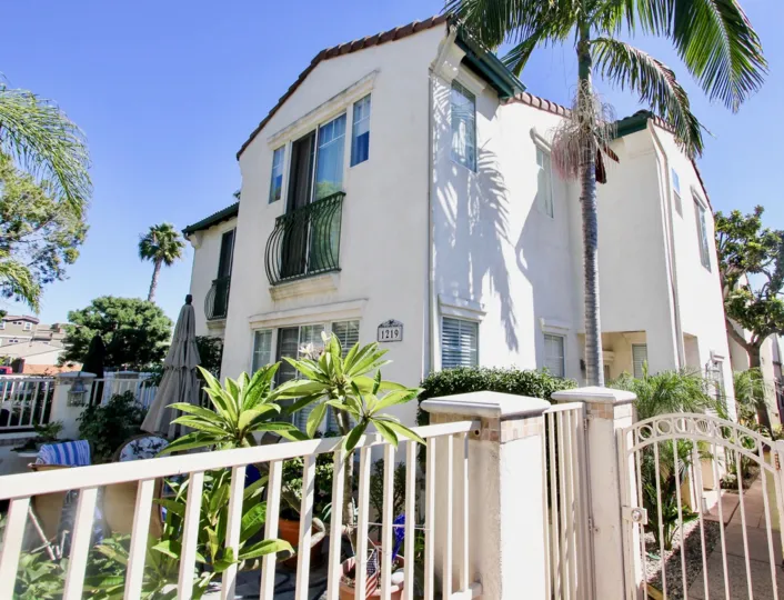 Sunny day side view of single home residence in 1219 Felspar, Pacific Beach, CA