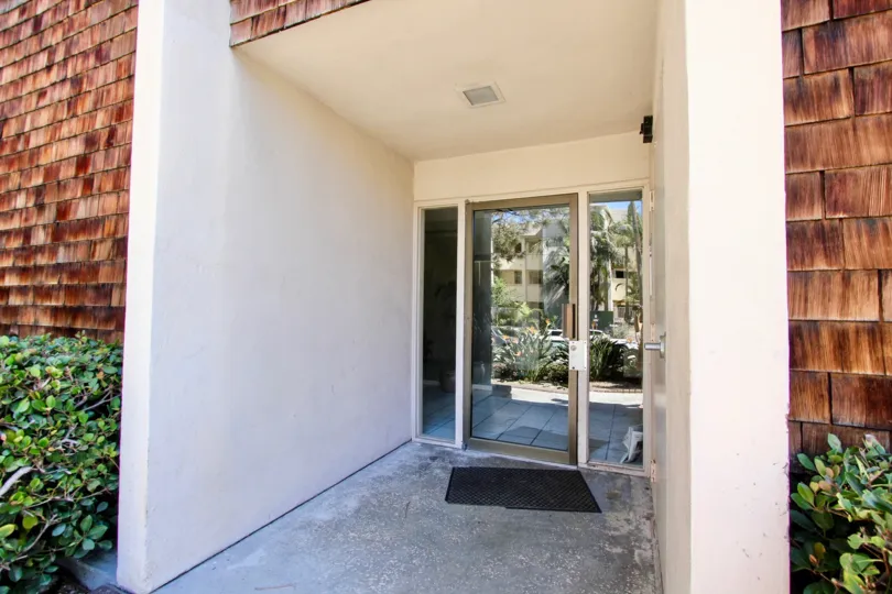 a warm day in the 3745 riviera with a house that has door in the glass