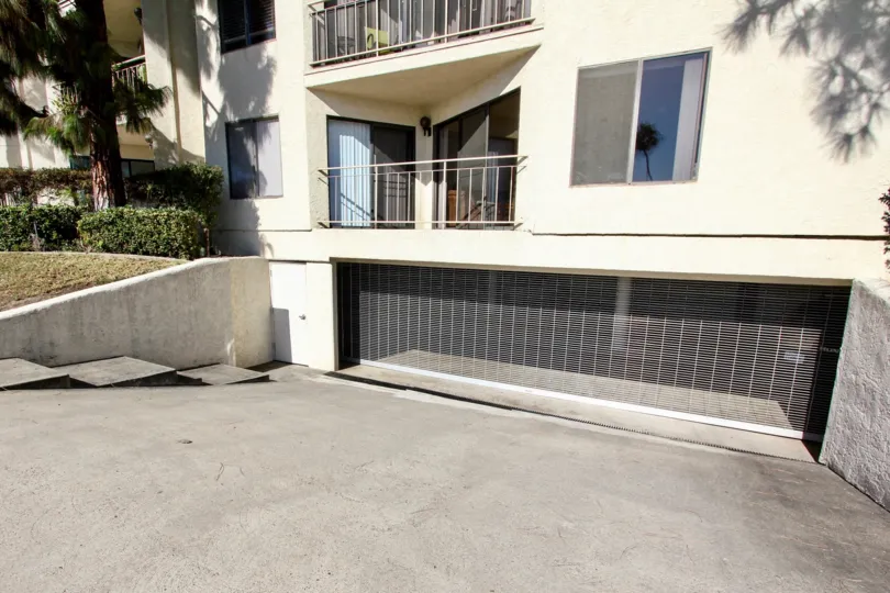 A spacious cellar entrance with lawn in front of a house in 3770 Crown Point of Pacific Beach