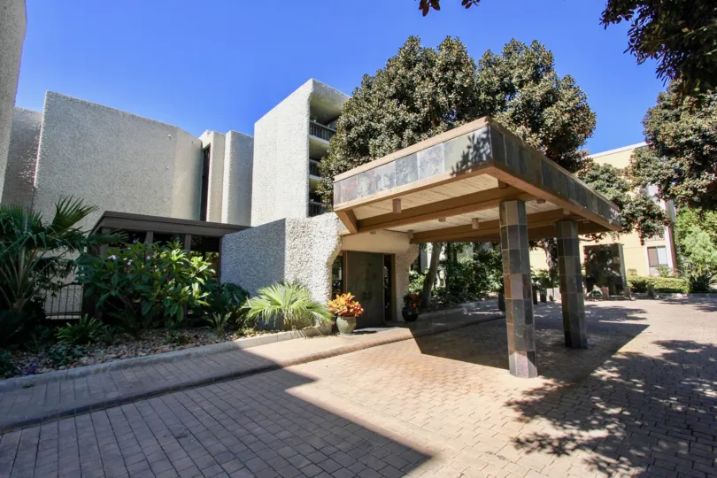 A left-side view of the Bay Scene community drop-off with decorative tiles.
