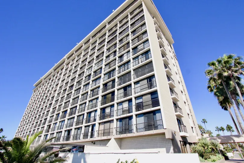 A mid-rise contemporary housing in the Capri by the Sea community with balconies.