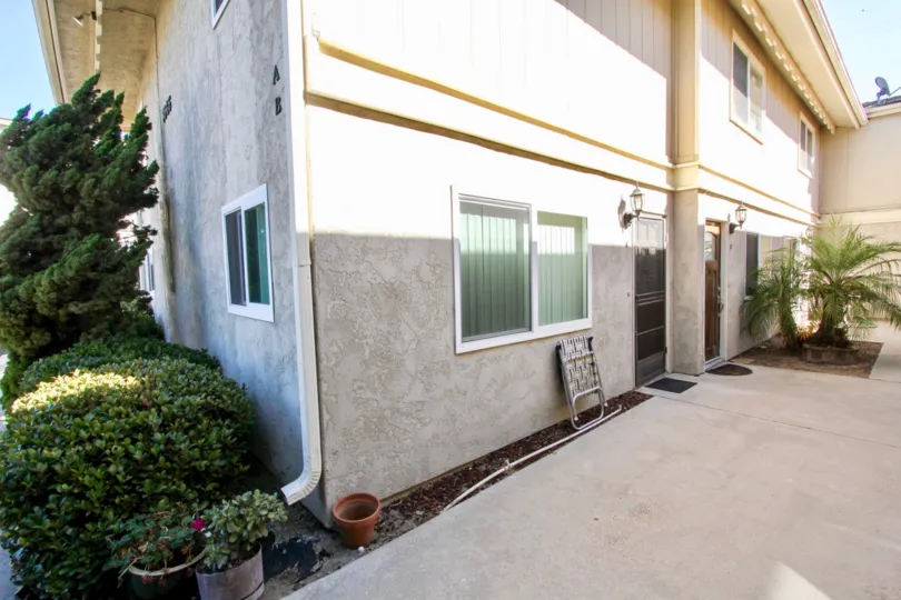 The Backside of a house with tress in its backyard of Casas Crown Point in California.