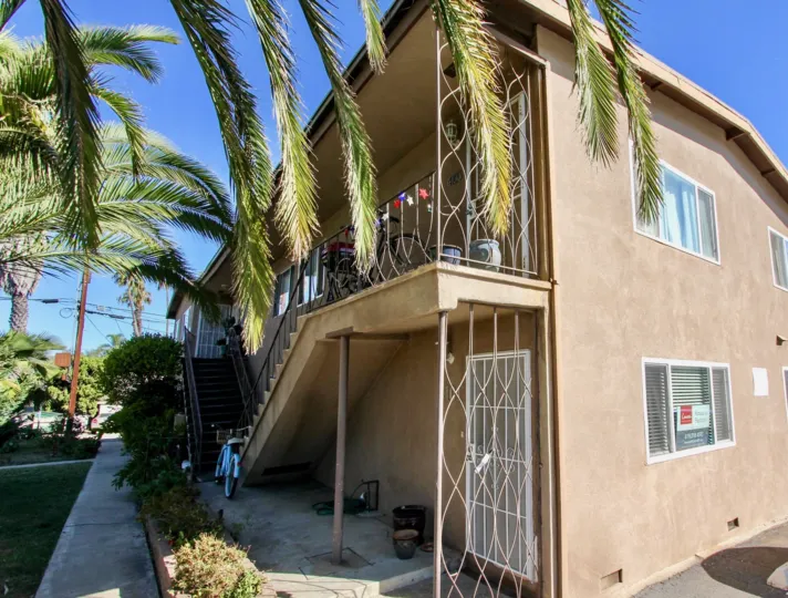 side view of a building with stairs meeting downward in the center