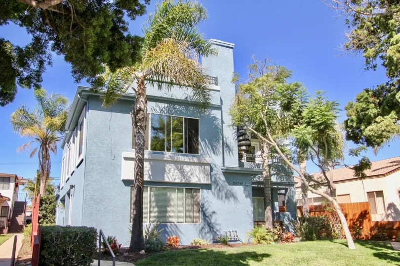 A two-storey residence in the Felspar Condos community painted in blue.