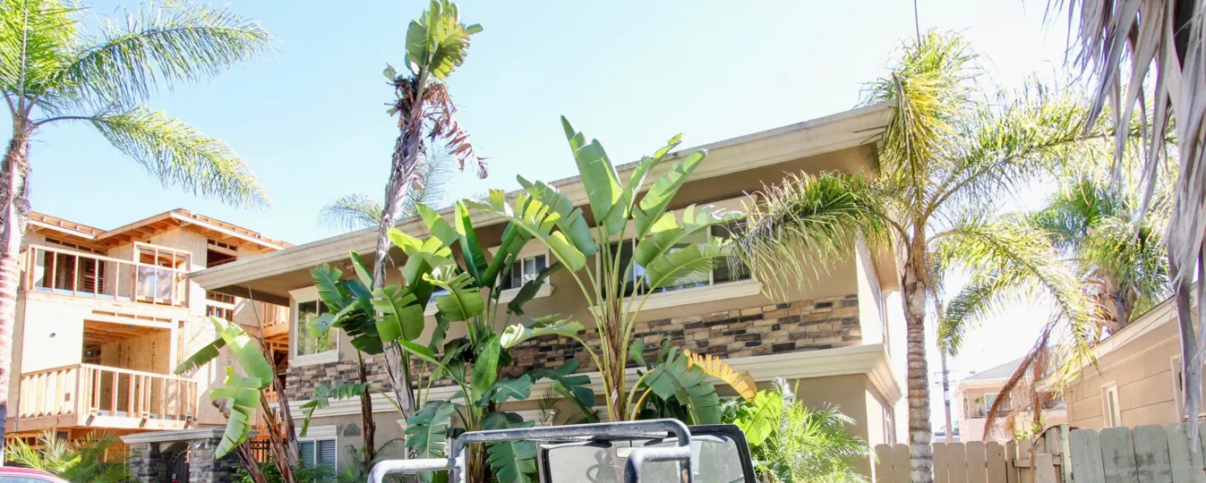 In Front of the House has trees and plants and vehicle is parking at Felspar Park